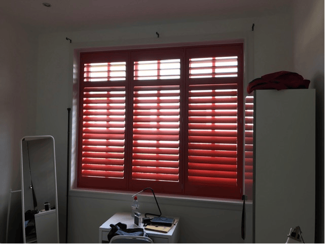 Bold red fitted shutters