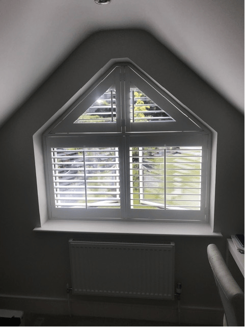Bespoke gable-shaped window shutters